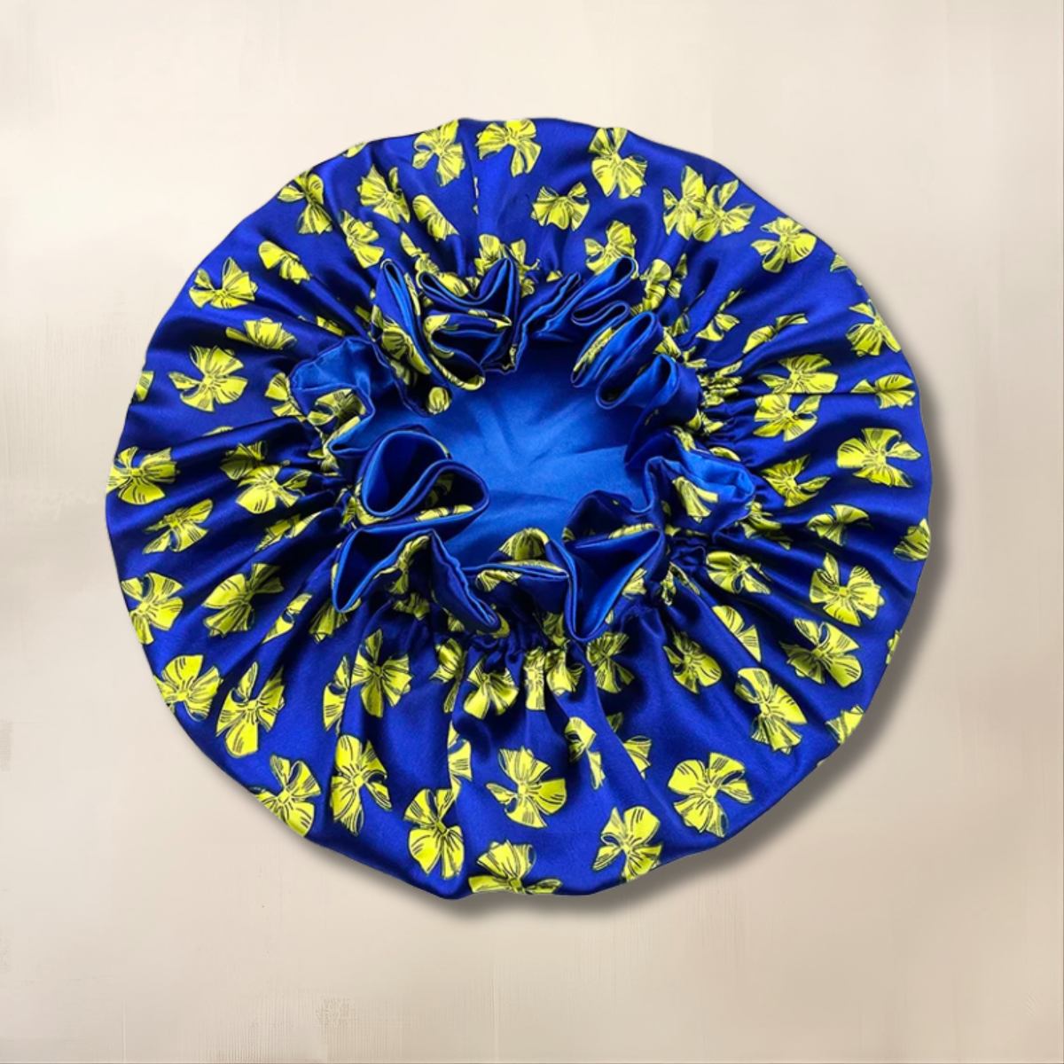 Bonnet réversible fleurie